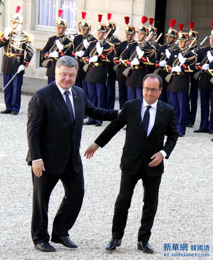 （国际）（2）乌克兰总统波罗申科抵巴黎参加法德俄乌峰会