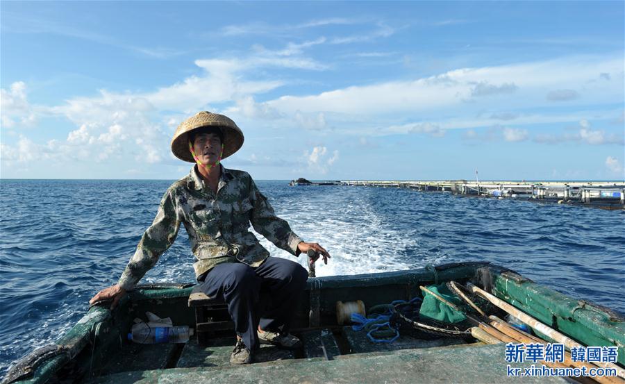 （城乡热点）（2）南沙美济礁渔民屯海戍边养殖热带鱼类