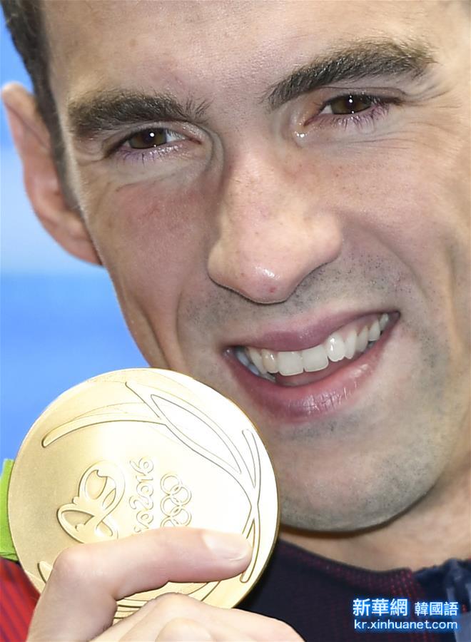 （里约奥运会·领奖台）（17）游泳——男子200米蝶泳：菲尔普斯夺冠