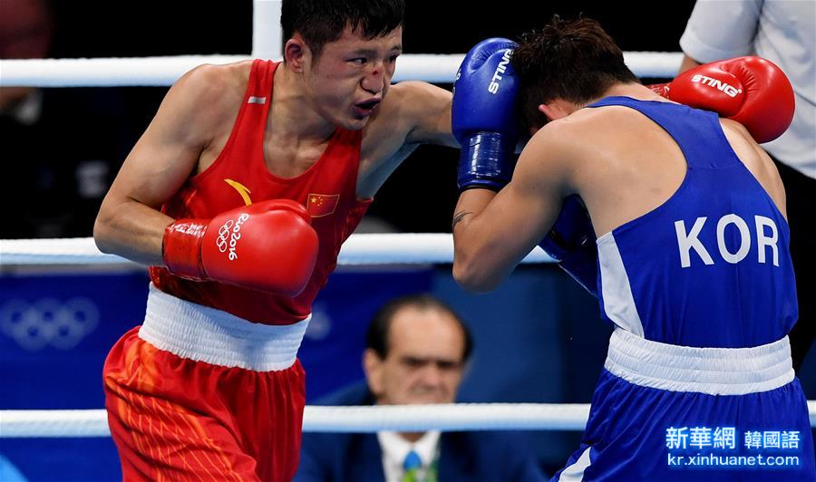 （里约奥运会）（4）拳击——男子56公斤级预赛：中国选手张家玮获胜