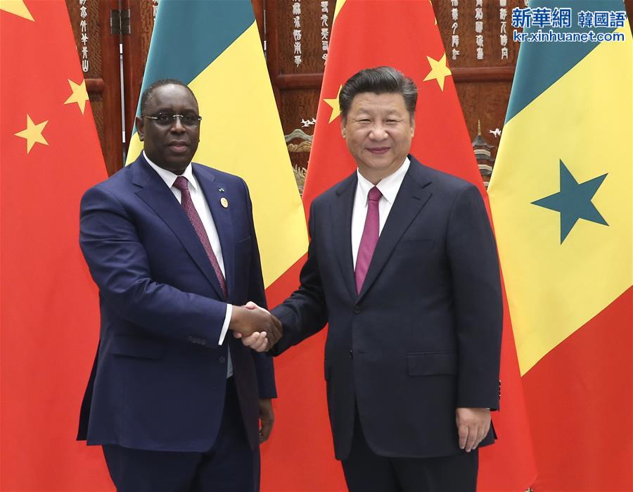 （杭州G20·时政）习近平会见塞内加尔总统萨勒