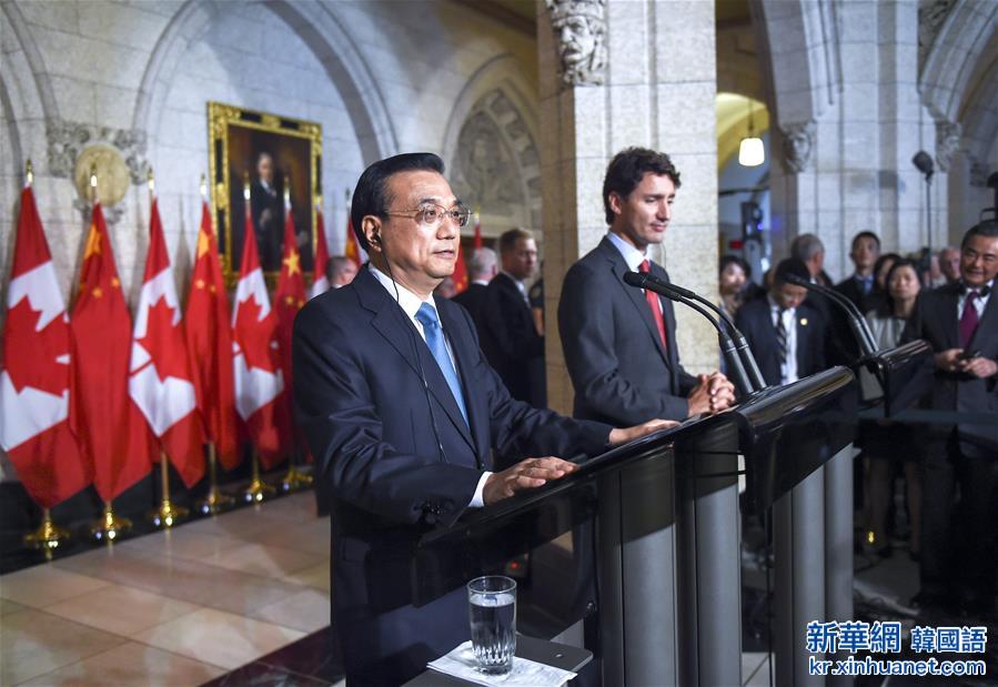 （时政）（1）李克强与加拿大总理特鲁多共同会见记者