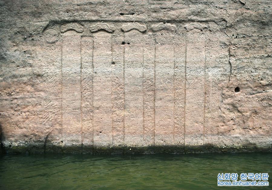 （文化）（5）江西南城一水库发现摩崖造像 “佛头”遗迹浮出水面