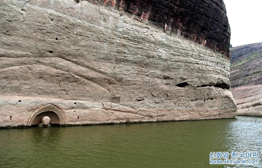 （文化）（2）江西南城一水库发现摩崖造像 “佛头”遗迹浮出水面
