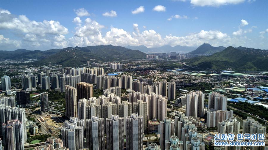 （新华全媒头条·香港回归二十周年·图文互动）（7）与祖国同舟共济 为梦想风雨兼程——庆祝香港回归20周年