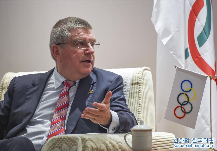 （体育）（3）国际奥委会主席巴赫面邀吴为山重塑《火炬手》