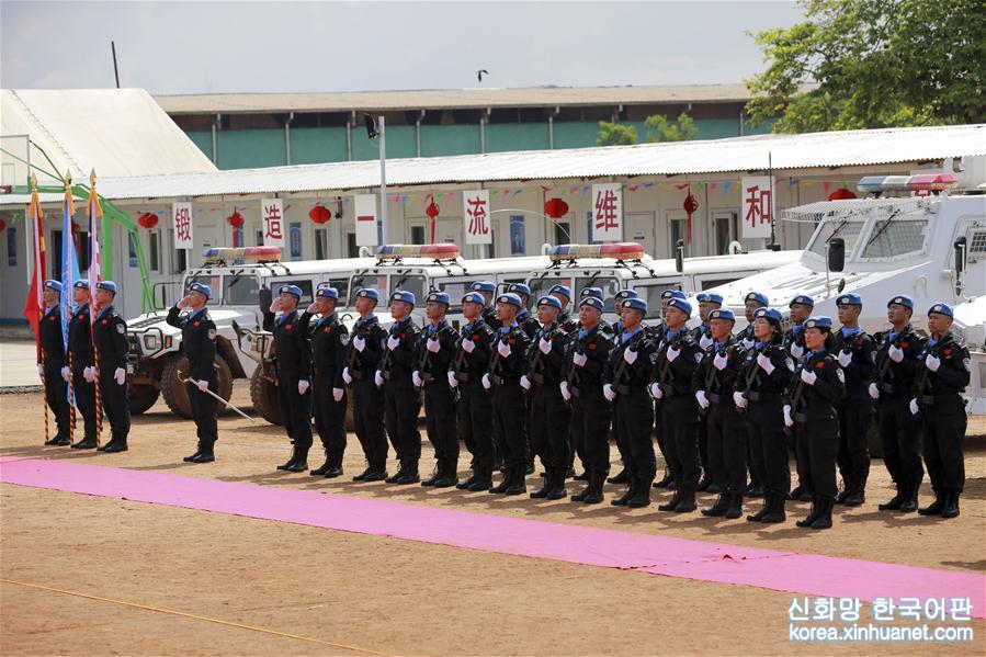 （国际·图文互动）（3）联合国授予中国第五支驻利比里亚维和警察防暴队全体队员和平勋章