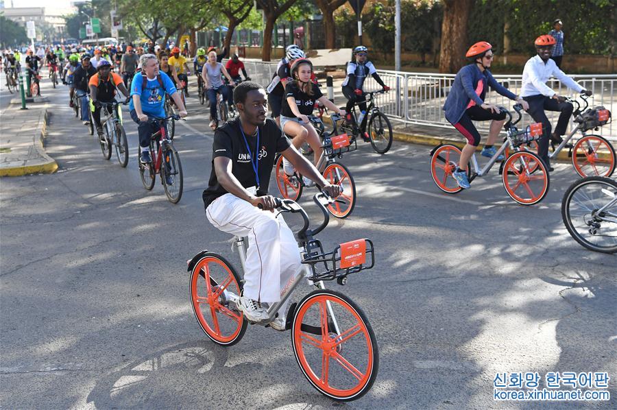 （国际·图文互动）（4）中国共享单车橙色旋风闪现非洲街头 