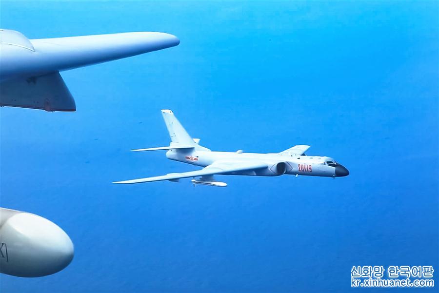（图文互动）（4）中国空军轰－6K等多型战机远洋训练战巡南海