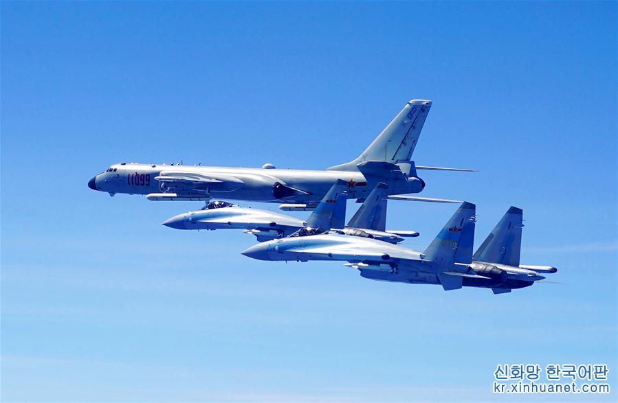 （圖文互動）（1）人民空軍多型戰機雙向繞飛臺島巡航 