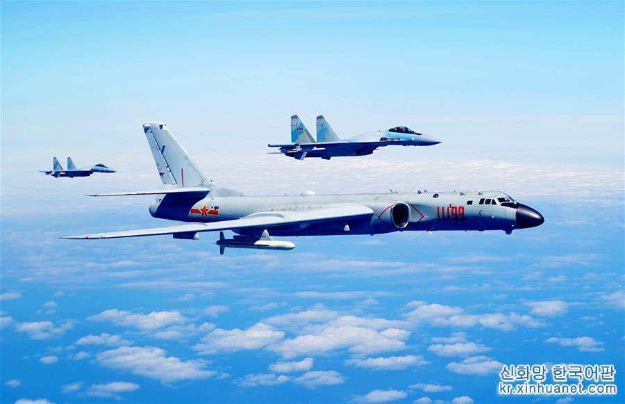 （图文互动）（1）空军发布宣传片展现歼-20、苏-35、轰-6K海上新航迹