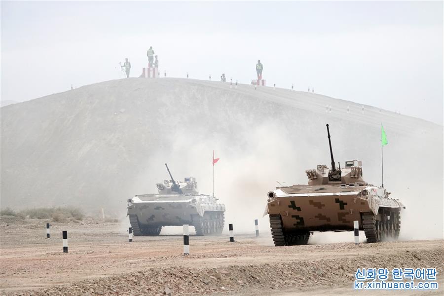 （军事）（8）“国际军事比赛——2018”中国承办的“苏沃洛夫突击”步战车组比赛在库尔勒开赛