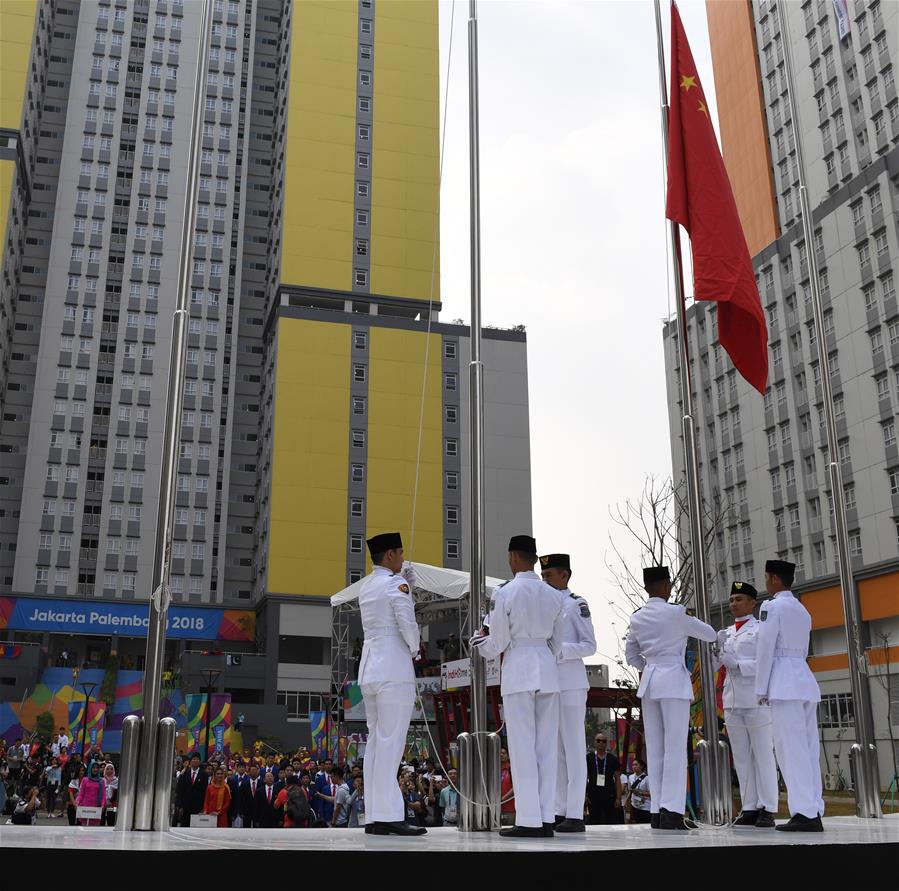 （亞運會）（1）第十八屆亞運會中國體育代表團在雅加達舉行升旗儀式
