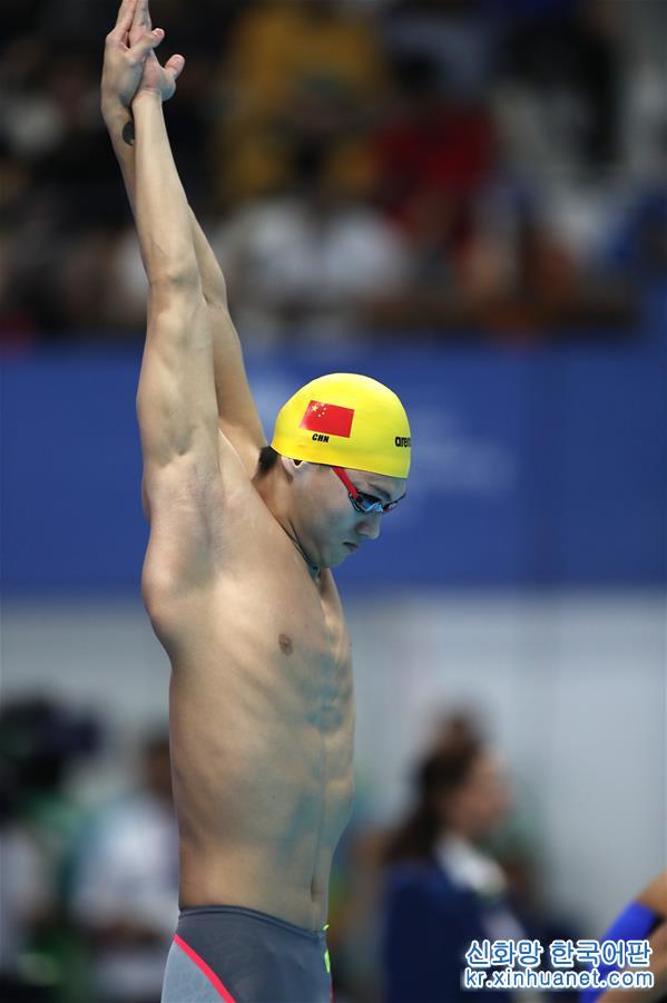 （亚运会）（24）游泳——男子100米仰泳：中国选手徐嘉余夺冠