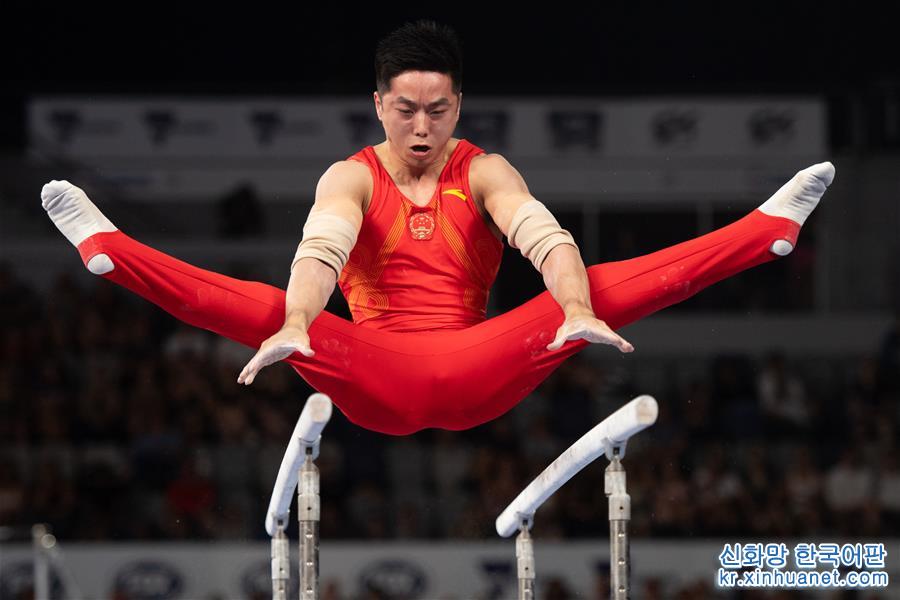 （体育）（4）体操——世界杯墨尔本站：中国选手尤浩获男子双杠金牌