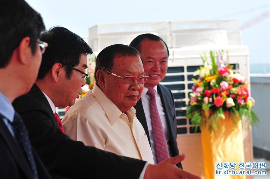 （国际）（1）老挝国家主席期望将老中国家级合作项目建成繁荣开发区