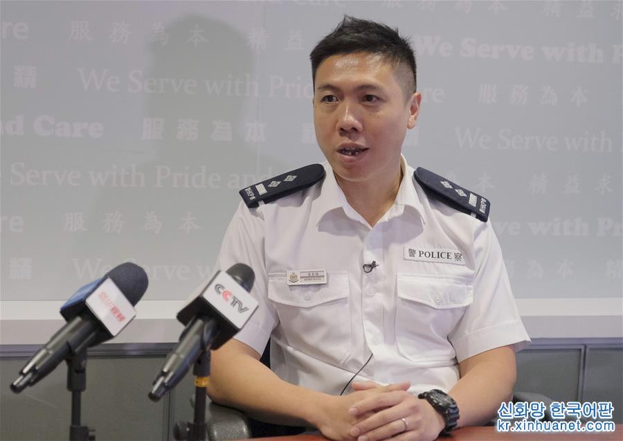 （图文互动）（1）香港警察：“为了维护法纪，受伤也值得！”