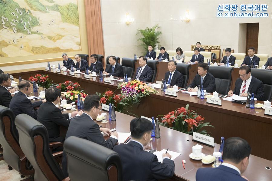 （时政）汪洋会见朝鲜、越南、老挝统一战线组织代表团