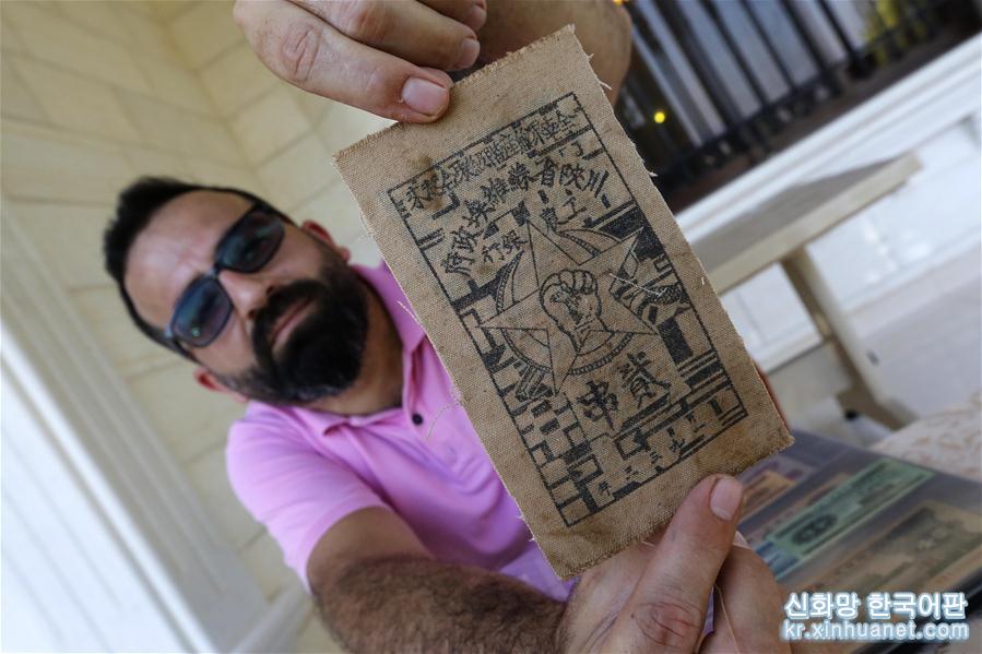 （国际）（5）黎巴嫩男子收藏纸币数创吉尼斯纪录