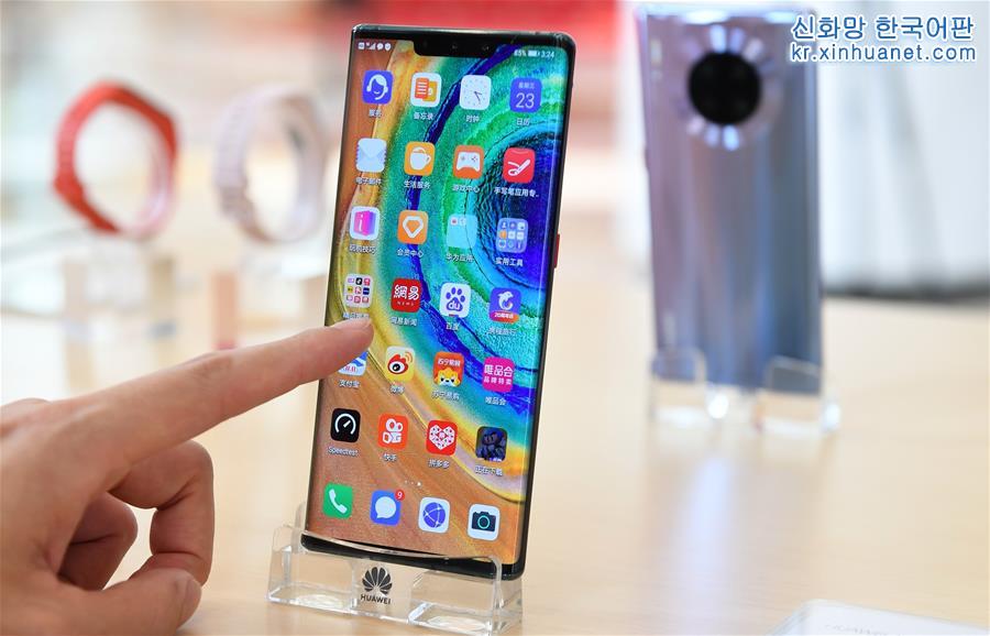 （经济）（1）华为2019年手机销量突破2亿台