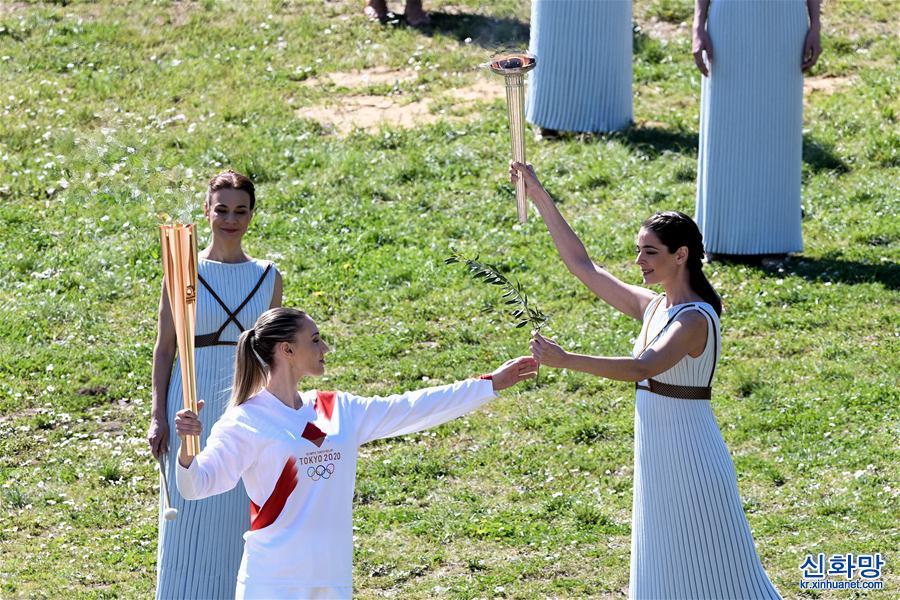 （体育）（15）东京奥运会圣火采集仪式举行