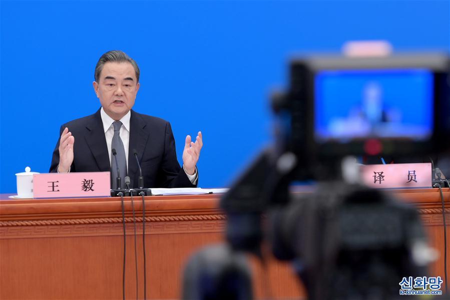 （兩會·XHDW）（15）國務委員兼外交部長王毅回答中外記者提問