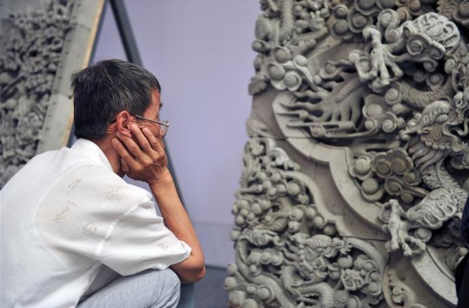 간쑤 린샤: 청벽돌로 조각해낸 “금수”